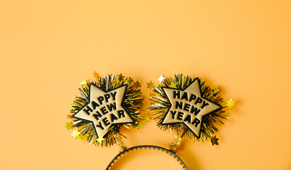 Image of a headband with stars on top for decoration that read "Happy New Year"