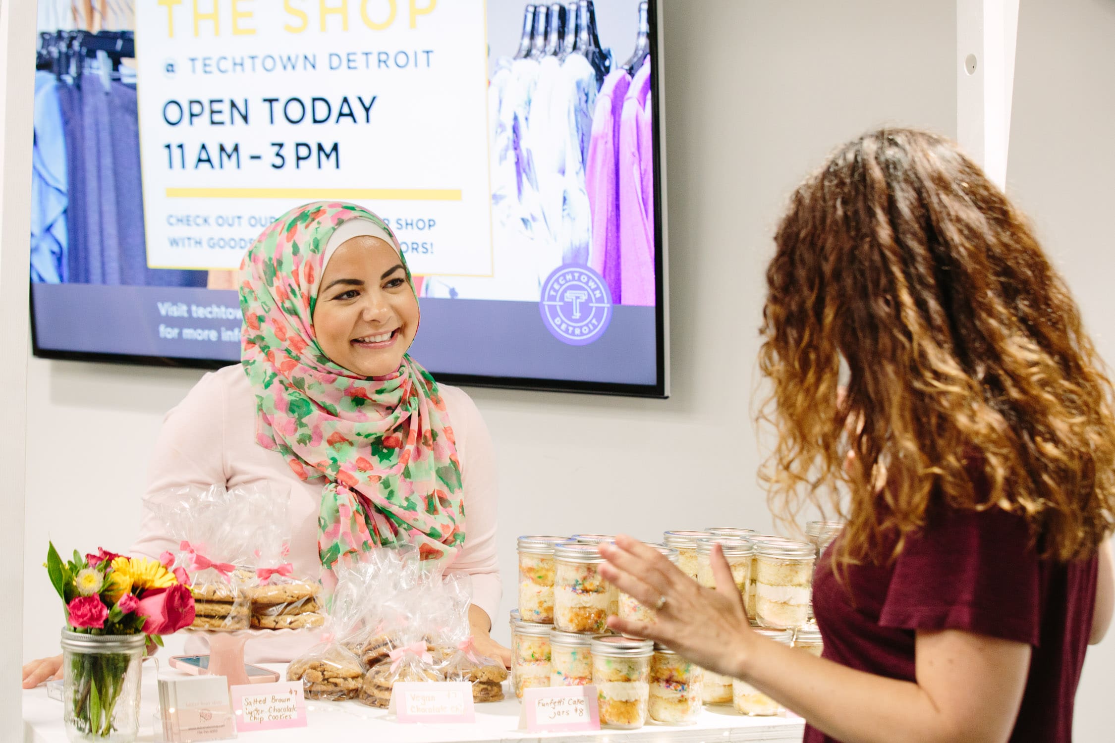 women selling products at pop up shop in Detroit