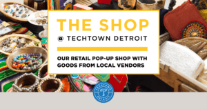 Reads- The shop Tech Town Detroit Our Retail pop-up shop with goods from local vendors With different handmade jewelry pictured in background