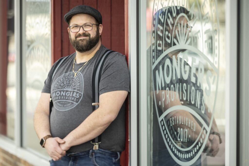 Zach Berg stands outside of his brick-and-mortar for Mongers' Provisions