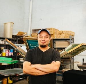 Photo of owner of Ideas Marketing in store